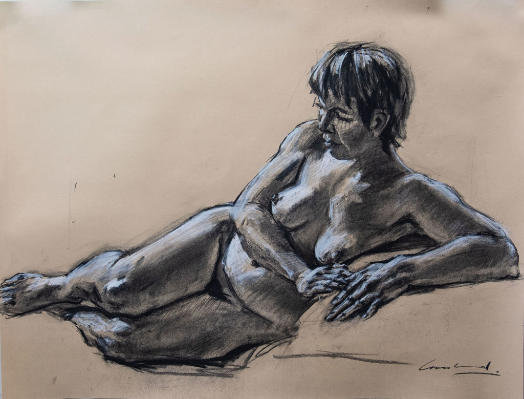 Charcoal and white chalk drawing of a woman reclining on her side on a pillow. By Tasmanian artist Rick Crossland.